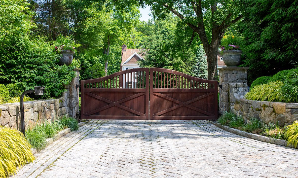 Traditional ipe driveway gate